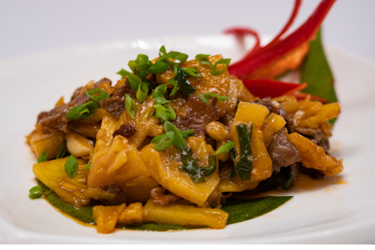 Char Mnosh Sach Kor-Fried Pineapple with Beef