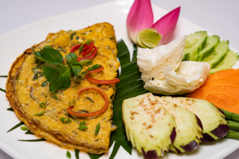 Pong Chearn Trei Prama -The Fried Egg with Prama Fish and vegetable.